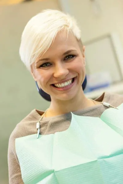 patient smiling after getting dental veneers at Meyer Dentistry